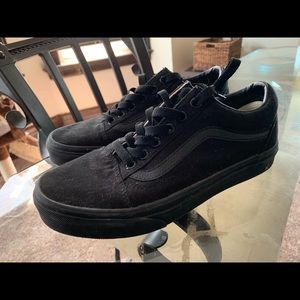 All black low top vans